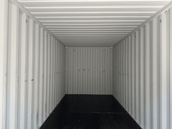 Looking the full length of an empty container interior to the closed far end