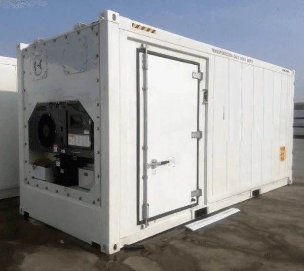 White reefer container fitted with a side personnel door beside the refrigeration unit