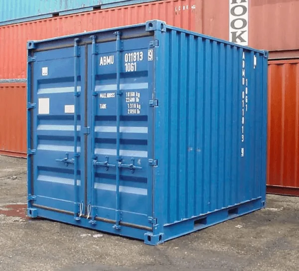 Blue 10ft standard container with S2 cargo doors, parked in front of stacked containers