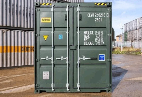Square-on view of the cargo doors on a one trip green 20ft container with its data panel