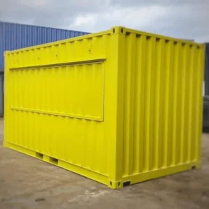 Yellow 20ft container converted with a long serving hatch along one side