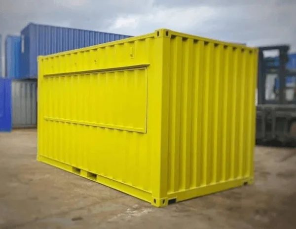 Yellow 20ft container converted with a long serving hatch along one side