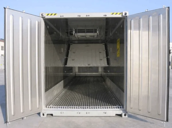 Reefer doors open showing the ribbed aluminium T-bar floor and insulated walls