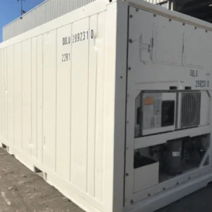White refrigerated container with its machinery unit built into one end