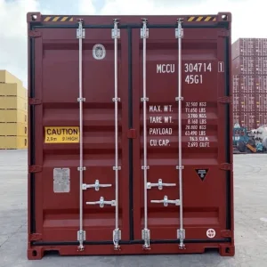 Dark red container photographed square on to its cargo doors and data panel