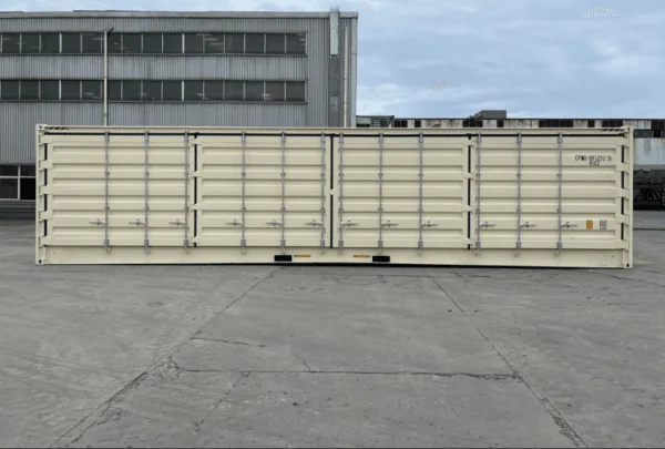 Side elevation of a beige open side container with its door panels latched shut