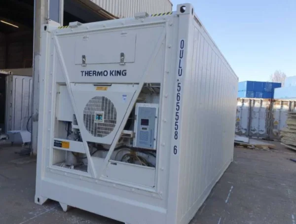 End of a white refrigerated container housing its Thermo King machinery