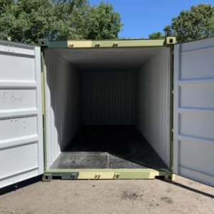 Camouflage painted 20ft container with both doors open on a sunny yard