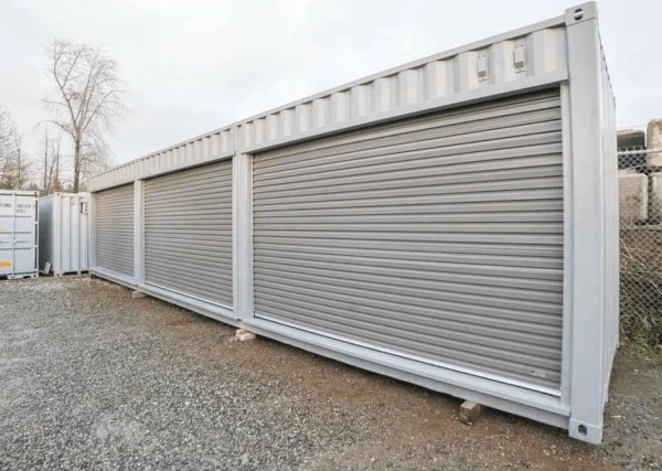 Angled view of a white container divided into several roller shutter compartments