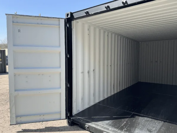 One cargo door held open against a black 20ft container, showing the lined interior