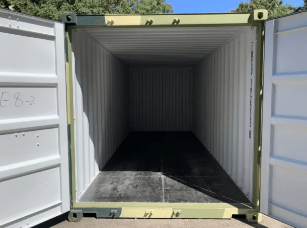 Camouflage container opened to show its pale lined walls and dark floor