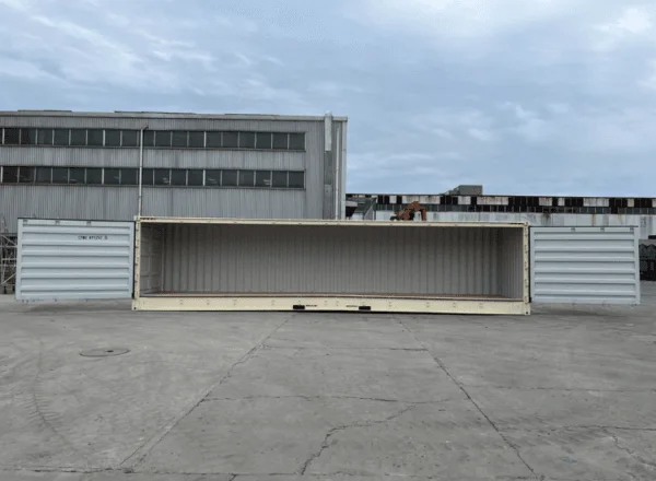 Whole side folded open on a beige 40ft container, showing the empty load space