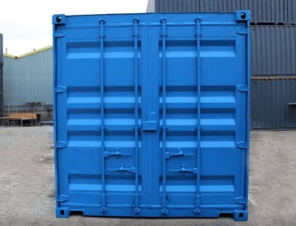 Refurbished blue 8ft container photographed square on to its doors