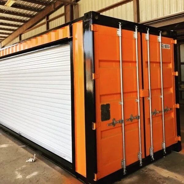 Orange 40ft container with a white roller shutter fitted into its side wall