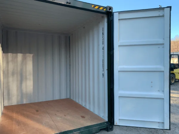 One cargo door swung back on a green 10ft container, revealing the lined interior